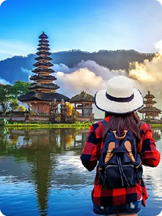 A traveller looking out over a Bali water temple, representing our International Tour package
