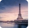 Eiffel Tower at dusk over the Seine