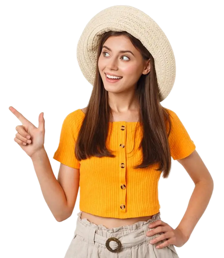 Smiling traveller in a straw hat pointing upward