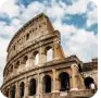 The Colosseum in Rome under a blue sky